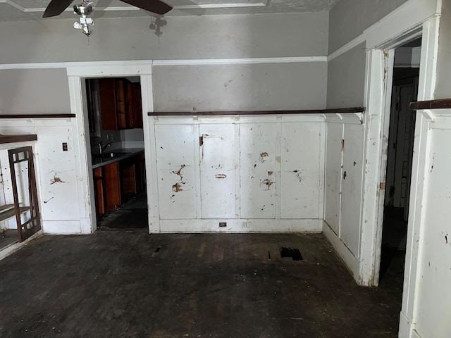 kitchen featuring a sink and ceiling fan