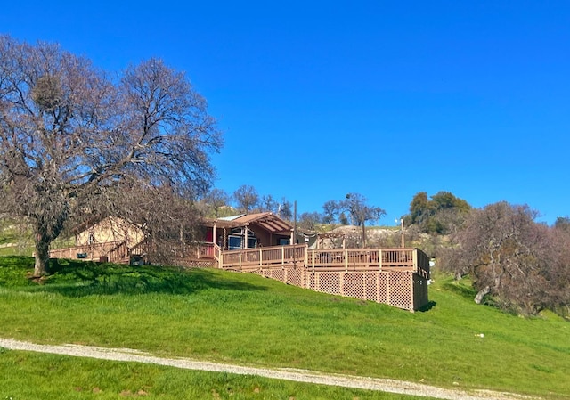 exterior space featuring a wooden deck