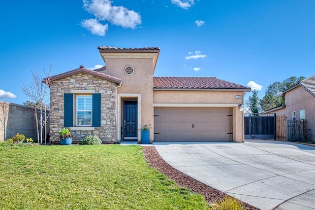 mediterranean / spanish house with driveway, a tiled roof, an attached garage, a front lawn, and stucco siding