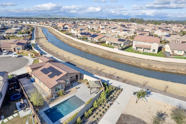 aerial view featuring a residential view and a water view