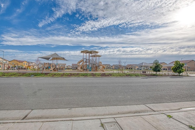 community playground featuring a residential view