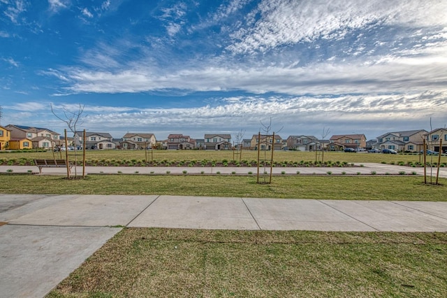 view of yard featuring a residential view