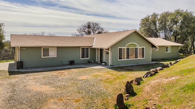 rear view of house featuring a patio