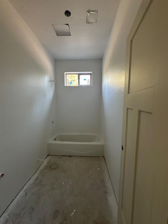 bathroom with a tub