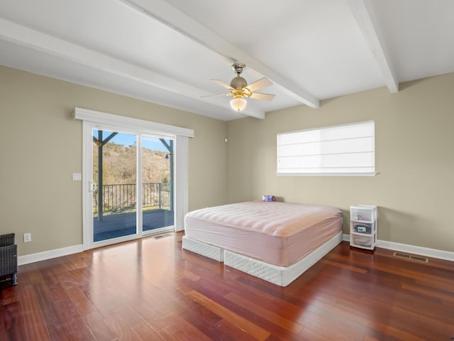 bedroom featuring access to outside, wood finished floors, visible vents, and baseboards