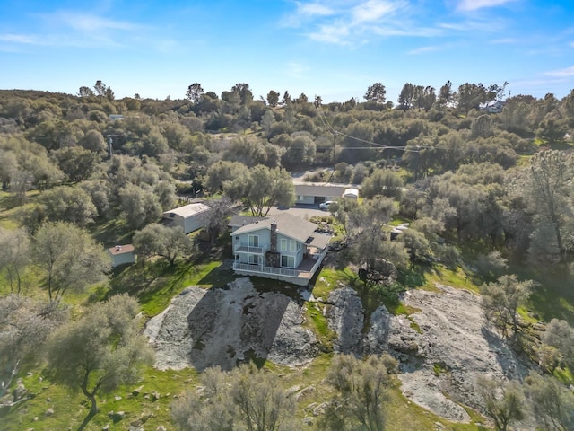 aerial view featuring a forest view