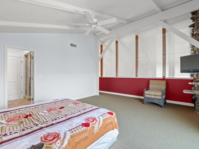 bedroom with carpet, visible vents, vaulted ceiling with beams, and baseboards