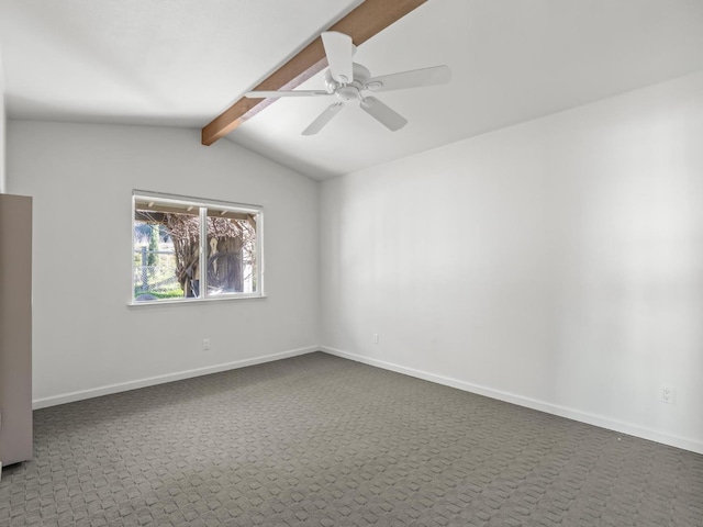 unfurnished room featuring dark colored carpet, vaulted ceiling with beams, baseboards, and ceiling fan