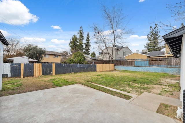 view of yard featuring a fenced backyard and a patio