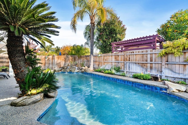 view of swimming pool featuring a fenced in pool and a fenced backyard