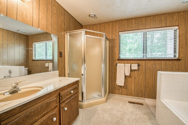 full bathroom with a shower stall and wooden walls