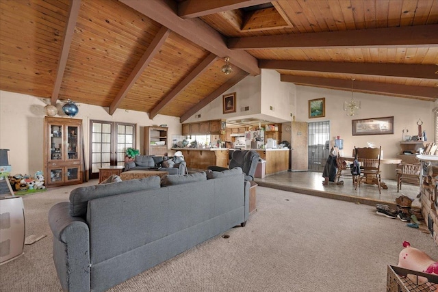 carpeted living area with high vaulted ceiling, french doors, beamed ceiling, and wooden ceiling