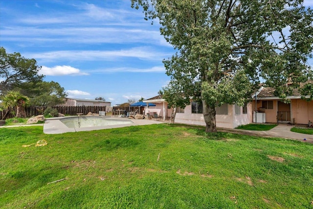 view of yard featuring a patio area and fence