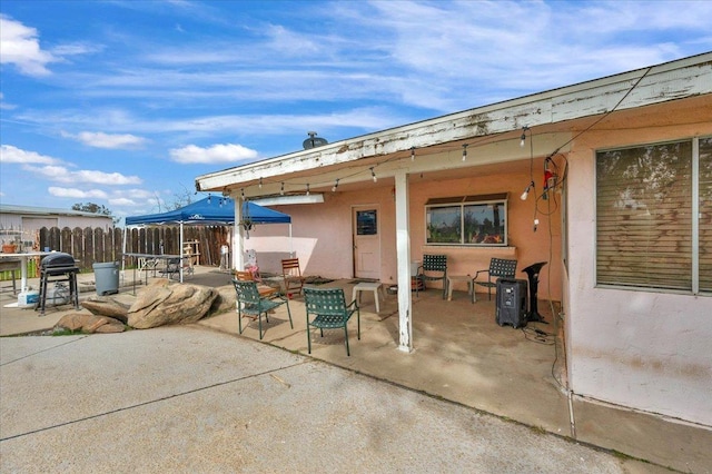 view of patio with fence