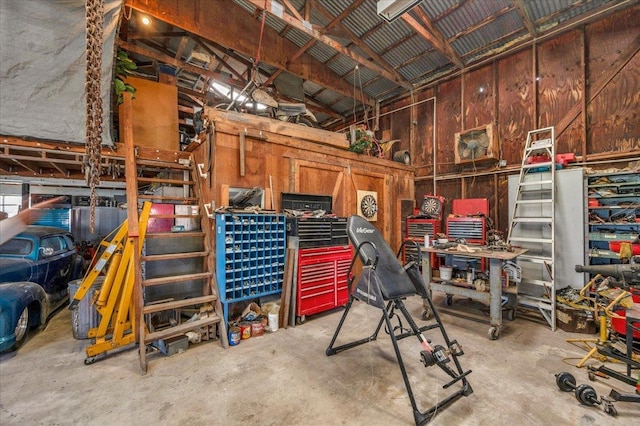 garage with a workshop area