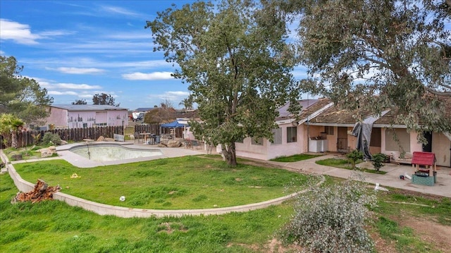 view of yard with a patio area and a fenced backyard