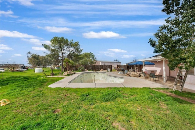 view of pool featuring a fenced backyard, a fenced in pool, a lawn, and a patio