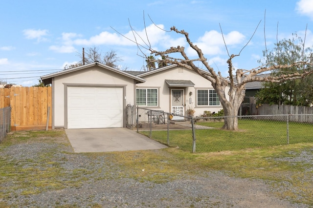 view of front facade with a fenced front yard, stucco siding, a garage, driveway, and a front lawn