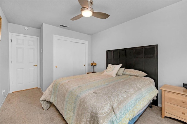 71 E Gettysburg Ave, Fresno, CA 93704 - bedroom featuring light carpet, a closet, and a ceiling fan