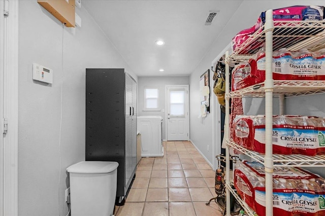 71 E Gettysburg Ave, Fresno, CA 93704 - washroom with recessed lighting, washer / clothes dryer, and light tile patterned floors