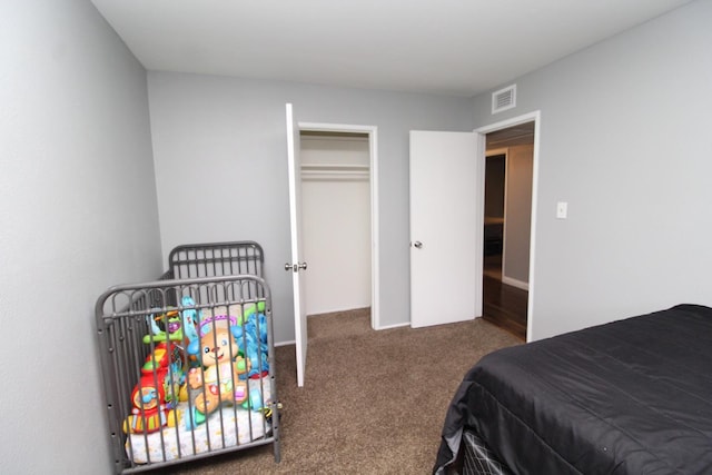 carpeted bedroom with visible vents