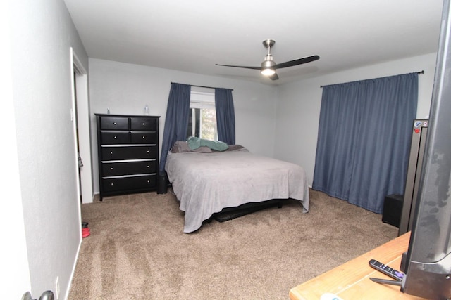 bedroom with carpet and a ceiling fan