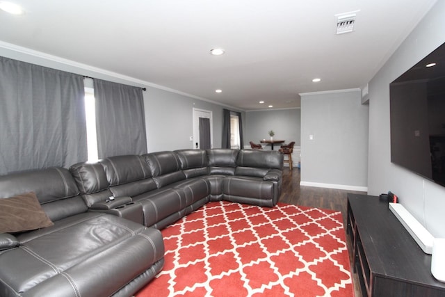 living room with recessed lighting, visible vents, ornamental molding, dark wood-type flooring, and baseboards