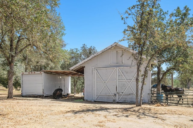 view of outbuilding featuring an outbuilding