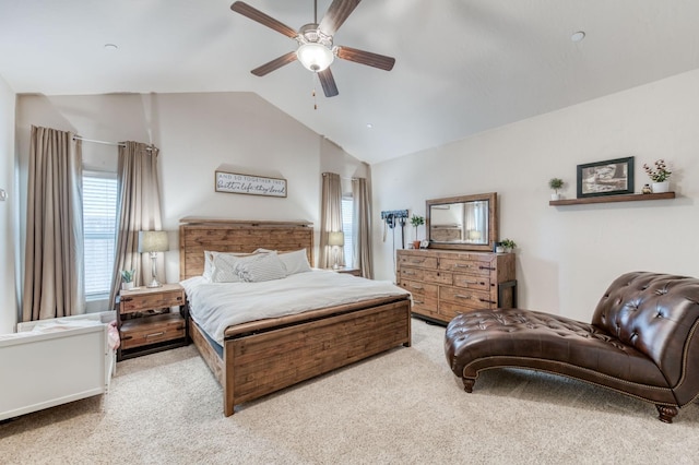 bedroom with lofted ceiling, carpet flooring, and ceiling fan