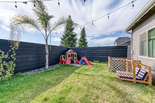 view of yard with a fenced backyard