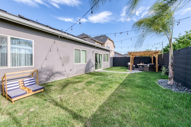 view of yard featuring a fenced backyard and a pergola