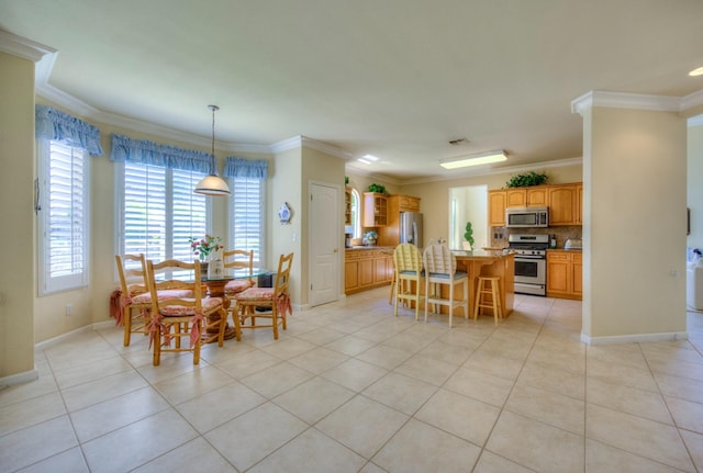 dining room with baseboards, visible vents, ornamental molding, and light tile patterned flooring