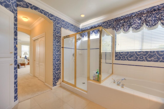 ensuite bathroom with a stall shower, crown molding, ensuite bath, and wallpapered walls