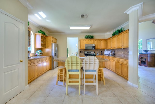 kitchen featuring light tile patterned floors, visible vents, appliances with stainless steel finishes, crown molding, and open shelves