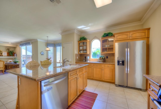 3033 Hanson Ave, Clovis, CA 93611 - kitchen featuring appliances with stainless steel finishes, light tile patterned flooring, glass insert cabinets, a sink, and backsplash