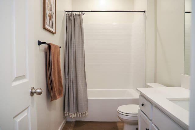 full bath featuring toilet, shower / bathtub combination with curtain, and vanity