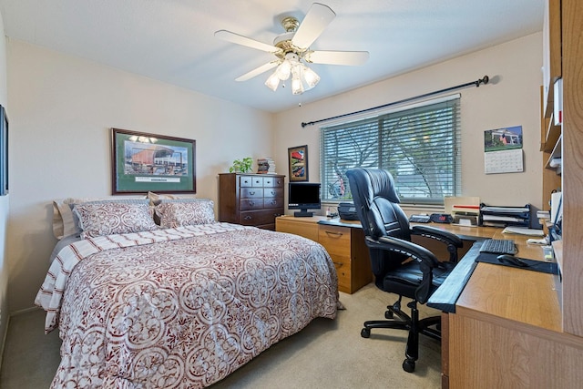 bedroom featuring a ceiling fan and light carpet