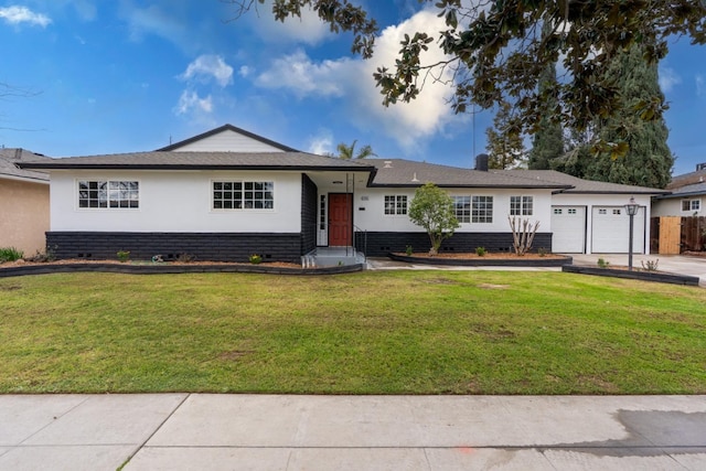 single story home with an attached garage, brick siding, and a front yard