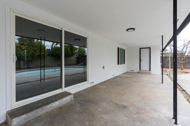 view of patio / terrace with a fenced in pool and a fenced backyard