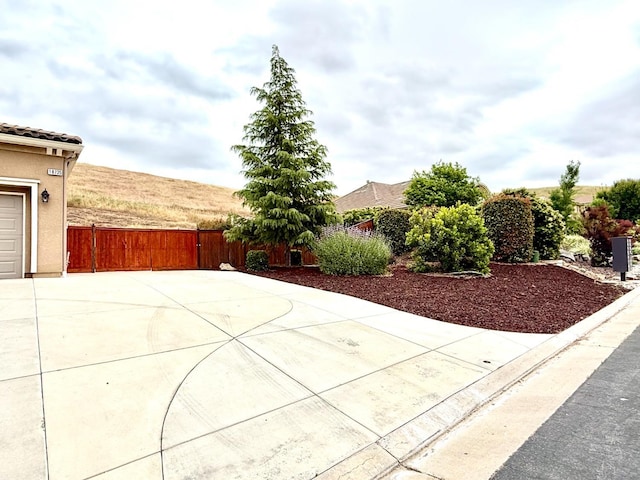 view of patio featuring fence