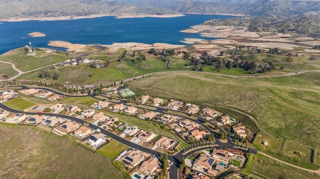 bird's eye view with a residential view and a water view