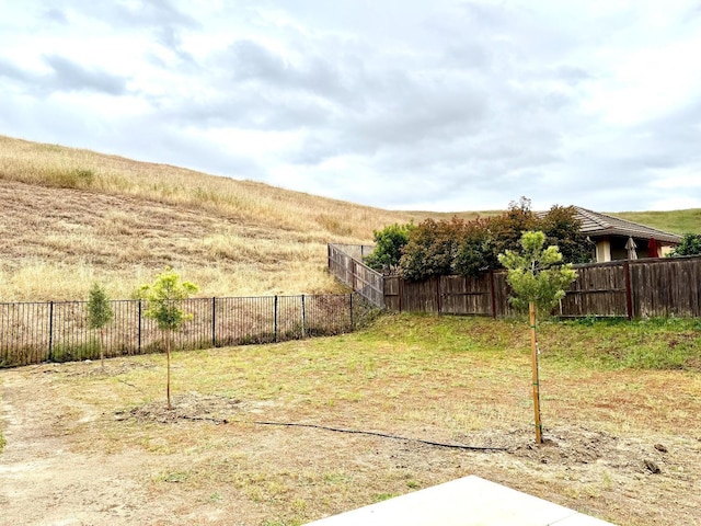 view of yard featuring fence