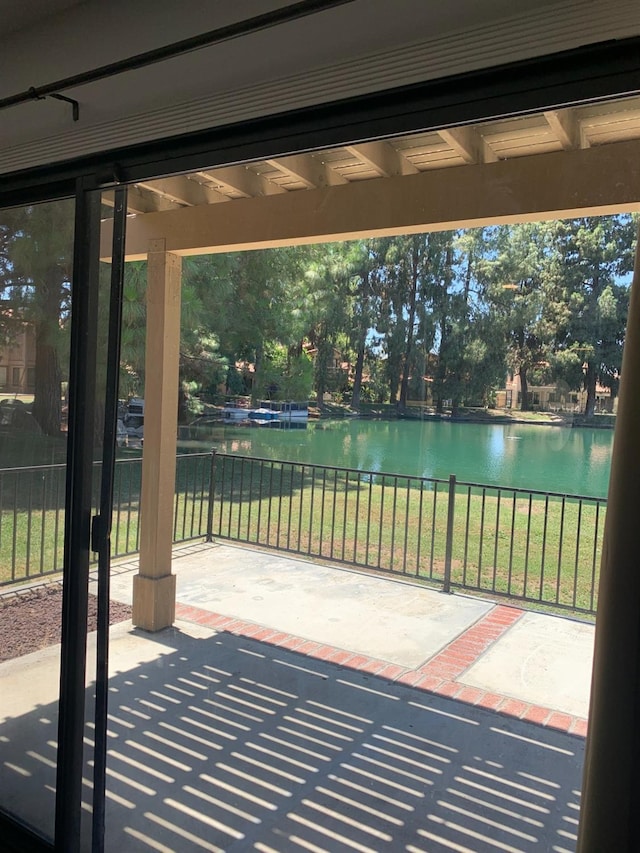 view of patio / terrace featuring a water view