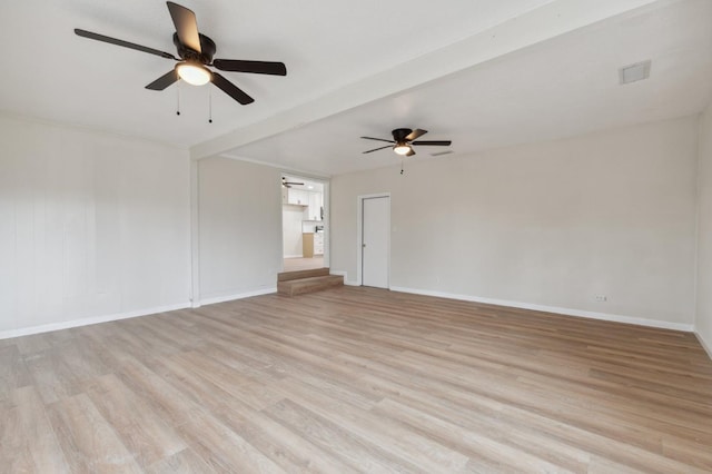 unfurnished room with ceiling fan, baseboards, and light wood-style flooring