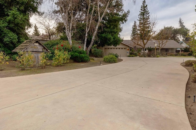 view of front of property with driveway and an attached garage