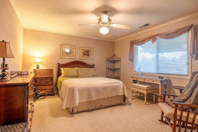 bedroom featuring ceiling fan, ornamental molding, visible vents, and light colored carpet