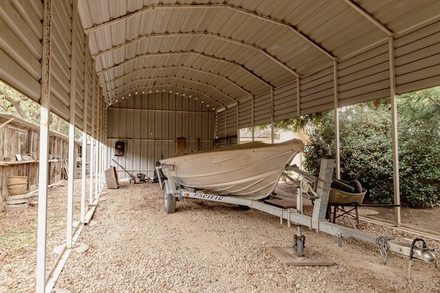 view of vehicle parking with a carport