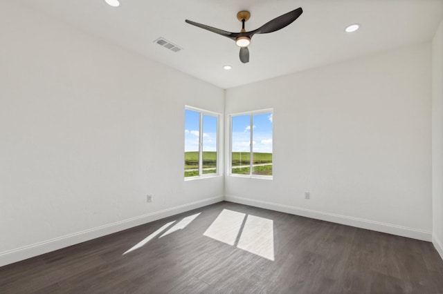 36950 Pauline Ave, Madera, CA 93636 - empty room featuring dark wood-type flooring, recessed lighting, baseboards, and visible vents