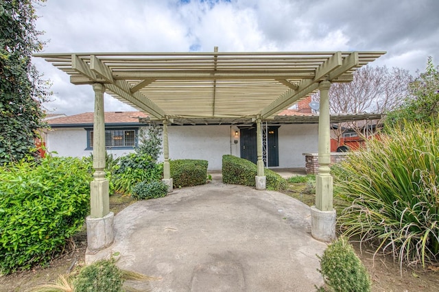 view of patio featuring a pergola