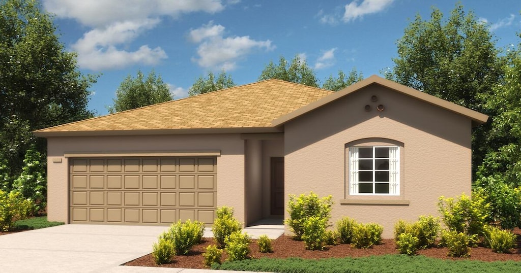 view of front facade with an attached garage, driveway, a shingled roof, and stucco siding